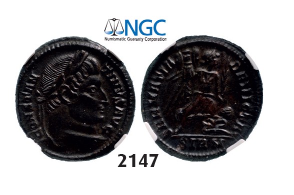 Lot: 2147. Roman Empire, Constantine I, 307-337 AD, Æ3 (Nummus) (Struck 324 AD) Sirmium, Billon (3.41g), NGC Ch AU